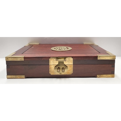 200 - A CHINESE ROSEWOOD JEWELLERY BOX, c.1960, with ornate brass trim, centre with brass Chinese characte... 