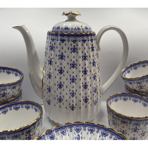 204 - A VINTAGE SPODE FINE BONE CHINA TEA SET, in the ‘Fleur de Lys Blue’ pattern, to include a teapot, si... 