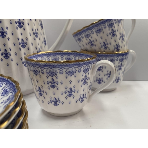 204 - A VINTAGE SPODE FINE BONE CHINA TEA SET, in the ‘Fleur de Lys Blue’ pattern, to include a teapot, si... 