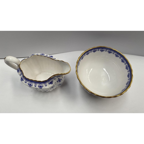 204 - A VINTAGE SPODE FINE BONE CHINA TEA SET, in the ‘Fleur de Lys Blue’ pattern, to include a teapot, si... 