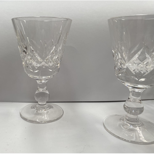 207 - A CUT GLASS LOT TO INCLUDE A WATERFORD CUT GLASS JUG, with star cut base, marked Waterford, along wi... 