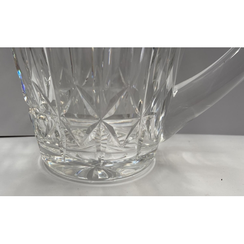 207 - A CUT GLASS LOT TO INCLUDE A WATERFORD CUT GLASS JUG, with star cut base, marked Waterford, along wi... 