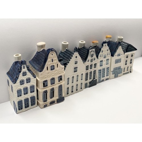 208 - A WONDERFUL COLLECTION OF DUTCH BLUE DELFT, to include (i) seven Delft Blue Holland buildings, all m... 