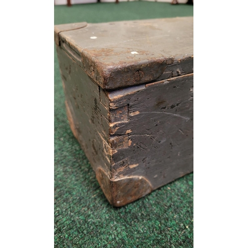 218 - AN ANTIQUE METAL BOUND PINE ARTILLERY BOX, 	with fabric strap handle to one end, the lid hinged with... 