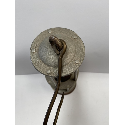 232 - AN ANTIQUE MINERS SAFETY LAMP, this form of lamp was approved for use in mines due to its improved v... 