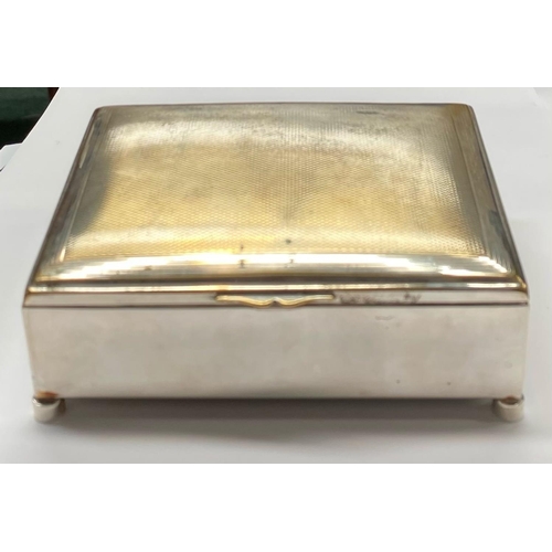 233 - AN ANTIQUE SILVER PLATED TRINKET BOX / CIGARETTE BOX, with engine turned design to centre, hinge ope... 