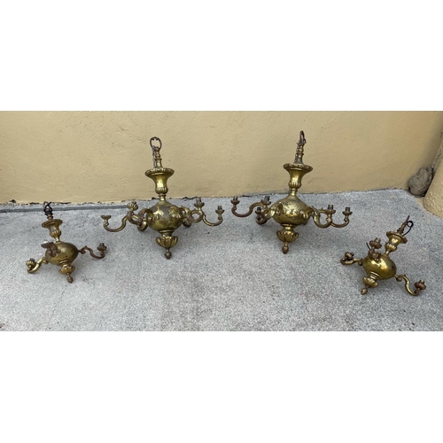 236 - A HEAVY METAL CHANDELIER LIGHT SUITE, includes four chandeliers, two with six branches, and two with... 