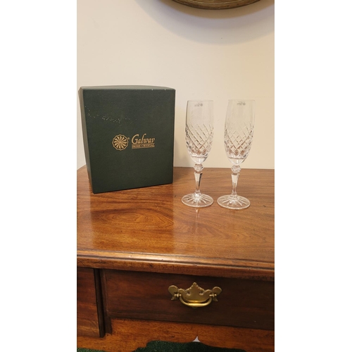 240 - A PAIR OF BOXED GALWAY CHRYSTAL WEDDING GLASSES, Bride & Groom champagne flutes; each glass engraved... 