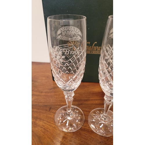 240 - A PAIR OF BOXED GALWAY CHRYSTAL WEDDING GLASSES, Bride & Groom champagne flutes; each glass engraved... 