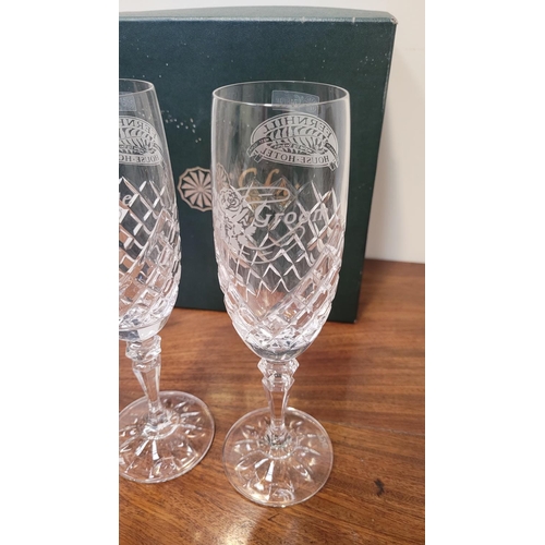 240 - A PAIR OF BOXED GALWAY CHRYSTAL WEDDING GLASSES, Bride & Groom champagne flutes; each glass engraved... 