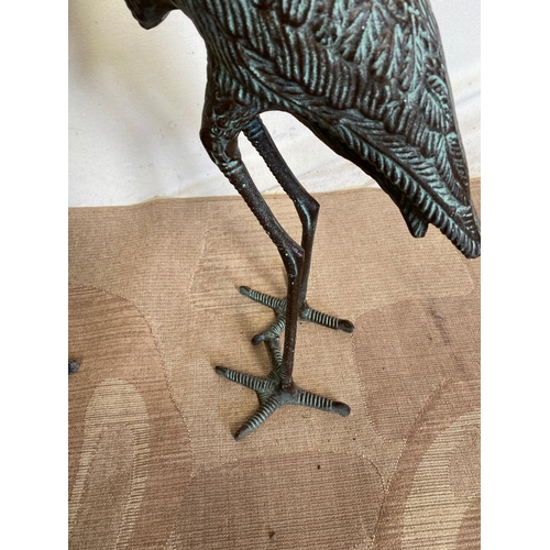 245 - A PAIR OF BRONZE STYLE GARDEN ORNAMENTS IN THE FORM OF CRANES, finely cast, Dimensions: larger: 85cm... 