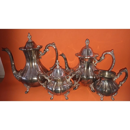 258 - AN AMERICAN SILVER PLATED TEA / COFFEE SERVICE; good quality; heavy. Includes a tea pot, coffee pot,... 