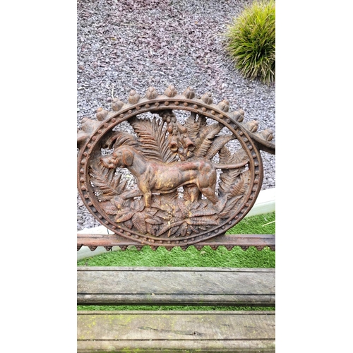 26 - A PAIR OF COALBROOKDALE STYLE CAST IRON GARDEN ARMCHAIRS, 	rust coloured, each with the hunting dog ... 