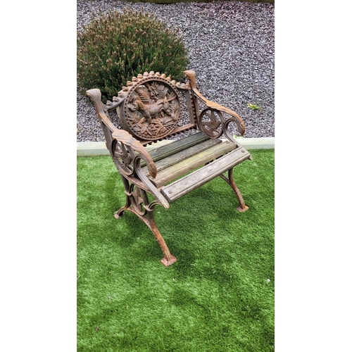 26 - A PAIR OF COALBROOKDALE STYLE CAST IRON GARDEN ARMCHAIRS, 	rust coloured, each with the hunting dog ... 