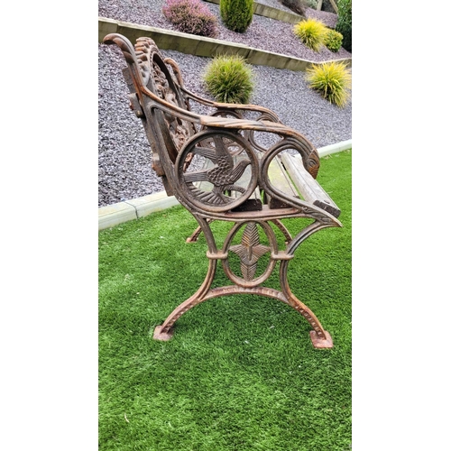 26 - A PAIR OF COALBROOKDALE STYLE CAST IRON GARDEN ARMCHAIRS, 	rust coloured, each with the hunting dog ... 