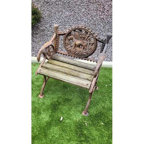 26 - A PAIR OF COALBROOKDALE STYLE CAST IRON GARDEN ARMCHAIRS, 	rust coloured, each with the hunting dog ... 