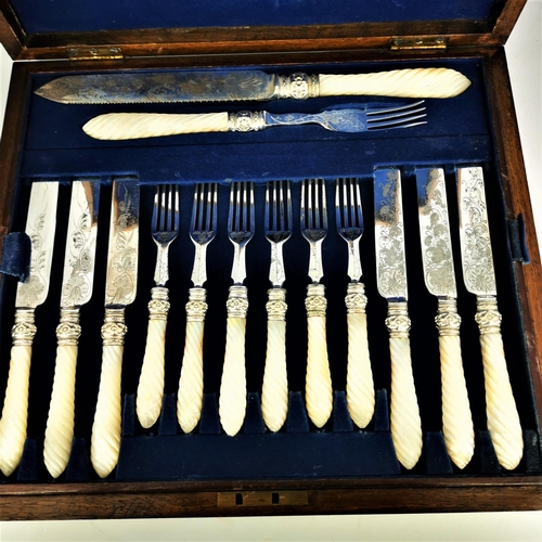 282 - A VERY FINE CASED SET OF KNIVES & FORKS,lovely burr wood to the lid, with blank cartouche to the cen... 