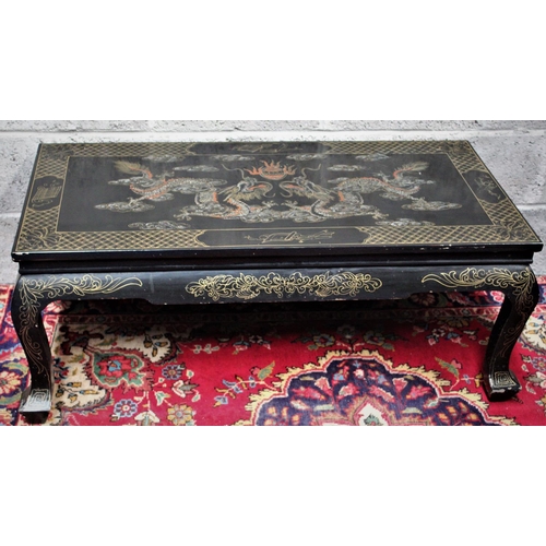 288 - A TWENTIETH CENTURY CHINOISERIE PAINTED COFFEE TABLE,	with a lacquered surface richly decorated with... 