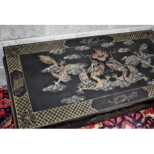 288 - A TWENTIETH CENTURY CHINOISERIE PAINTED COFFEE TABLE,	with a lacquered surface richly decorated with... 