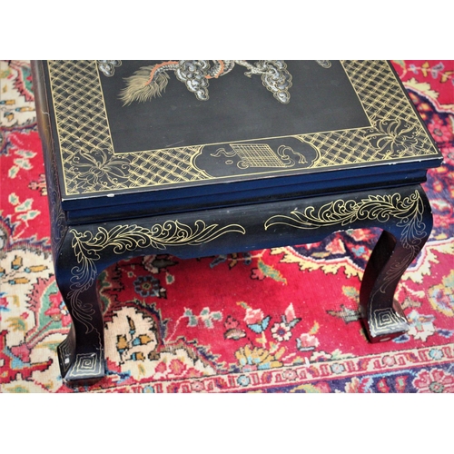 288 - A TWENTIETH CENTURY CHINOISERIE PAINTED COFFEE TABLE,	with a lacquered surface richly decorated with... 