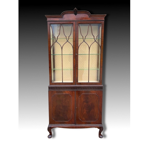 3 - A GOOD QUALITY MAHOGANY CHIPPENDALE STYLE GLZED DISPLAY CABINET, the top with raised centre having a... 