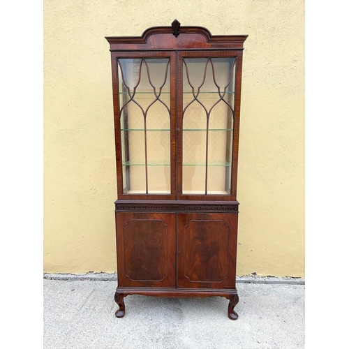 3 - A GOOD QUALITY MAHOGANY CHIPPENDALE STYLE GLZED DISPLAY CABINET, the top with raised centre having a... 