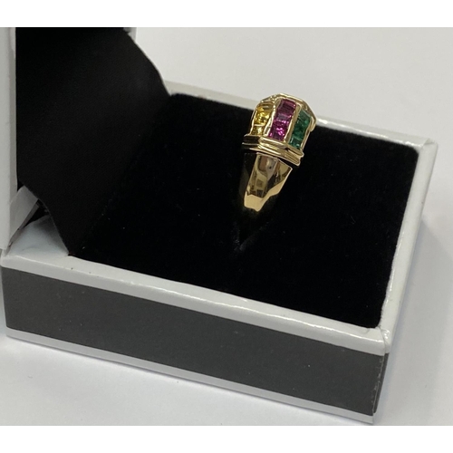 35 - A FANTASTIC CHANEL SET RUBY, EMERALD & YELLOW SAPPHIRE DRESS RING, with 18ct gold band, this ring re... 