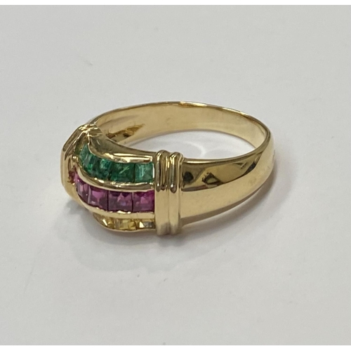 35 - A FANTASTIC CHANEL SET RUBY, EMERALD & YELLOW SAPPHIRE DRESS RING, with 18ct gold band, this ring re... 