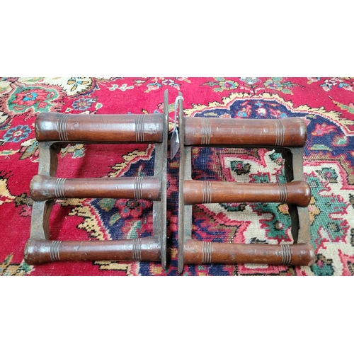 47 - A PAIR OF CAST IRON WALL MOUNTABLE HARNESS RACKS, 	embossed with Musgrave Patent Belfast to both cas... 