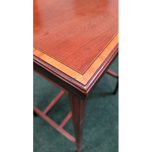 50 - A GOOD QUALITY EDWARDIAN FOLDOVER GAMES TABLE 	neatly proportioned table from the early 20th century... 