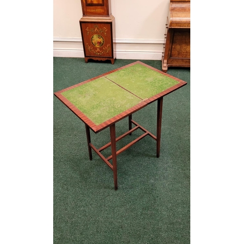 50 - A GOOD QUALITY EDWARDIAN FOLDOVER GAMES TABLE 	neatly proportioned table from the early 20th century... 