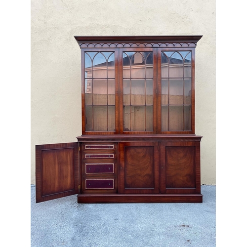 54 - A GOOD MAHOGANY LIBRARY/GLAZED BOOKCASE, with stepped tapered pediment over a band of gadrooned deta... 