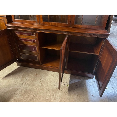 54 - A GOOD MAHOGANY LIBRARY/GLAZED BOOKCASE, with stepped tapered pediment over a band of gadrooned deta... 