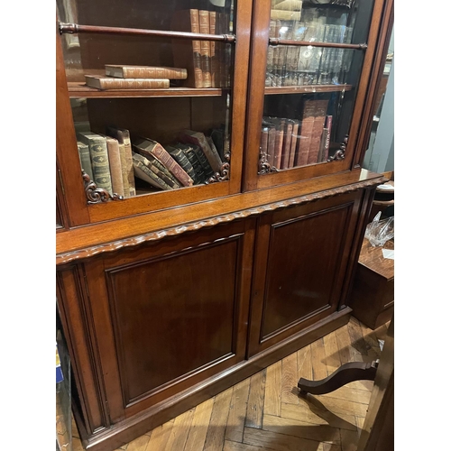 55 - A VERY FINE IRISH MAHOGANY TWO DOOR GLAZED BOOKCASE BY STRAHAN, OF DUBLIN, a fantastic piece of Iris... 