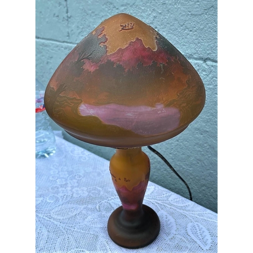 56 - AN ART NEAVEAU STYLE CAMEO GLASS TABLE LAMP, mushroom shaped, decorated with a landscape scene to th... 