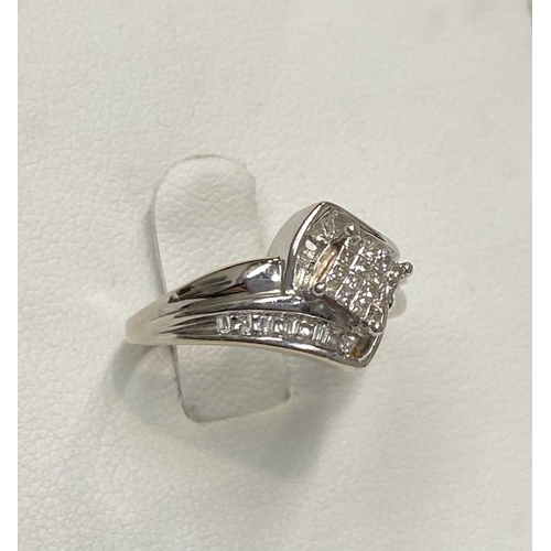 69 - A BEAUTIFUL WHITE GOLD DIAMOND CROSS-OVER RING, a really dynamic piece of handmade jewellery; with a... 