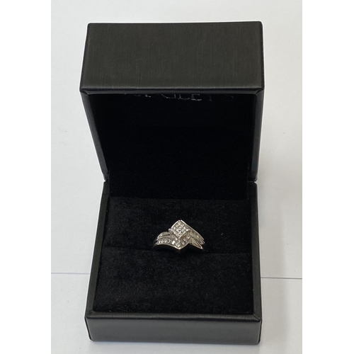 69 - A BEAUTIFUL WHITE GOLD DIAMOND CROSS-OVER RING, a really dynamic piece of handmade jewellery; with a... 