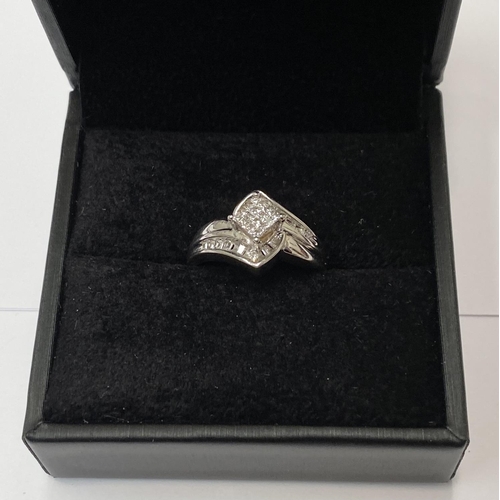 69 - A BEAUTIFUL WHITE GOLD DIAMOND CROSS-OVER RING, a really dynamic piece of handmade jewellery; with a... 