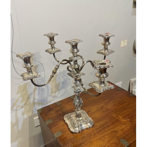 70 - A FINE PAIR OF LATE 19TH CENTURY SILVER PLATED CANDELABRA, in the Rococo style, with a set of four r... 