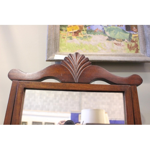 71 - A GOOD QUALITY LARGE TABLE TOP SWING MIRROR, with carved central shell detail to the top, the mirror... 