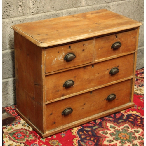 78 - A RUSTIC PINE COUNTRY CHEST OF DRAWERS	aged and worn but with delightful character; the wood knottin... 