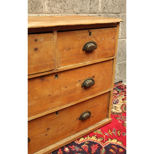 78 - A RUSTIC PINE COUNTRY CHEST OF DRAWERS	aged and worn but with delightful character; the wood knottin... 