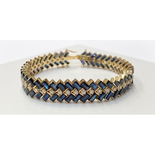 8 - A STUNNING SAPPHIRE & DIAMOND ART DECO STYLE BRACELET, with yellow cold body having approximately 27... 