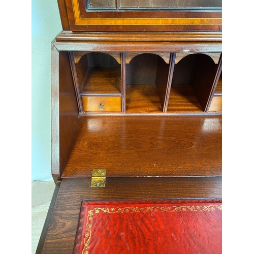 83 - A WILLIAM IV STYLE MAHOGANY GLAZED MAHOGANY BUREAU BOOKCASE, with moulded cornice, astral glazed gla... 