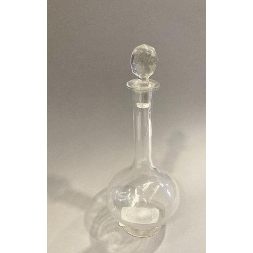 97 - AN IRISH GLASS DECANTER WITH STOPPER, tall necked with rounded body and flat circular base, 25cm hig... 