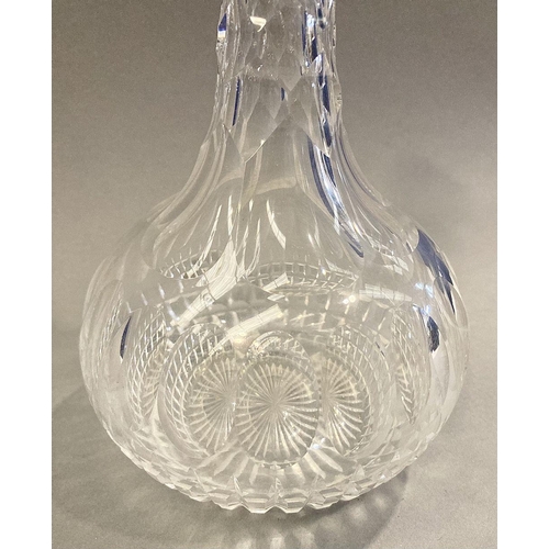 98 - A VICTORIAN CUT GLASS DECANTER, 19th Century, with shaft and globe shape, diamond cut shaft and base... 