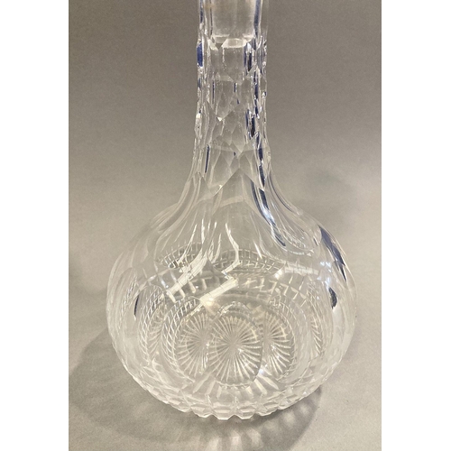 98 - A VICTORIAN CUT GLASS DECANTER, 19th Century, with shaft and globe shape, diamond cut shaft and base... 