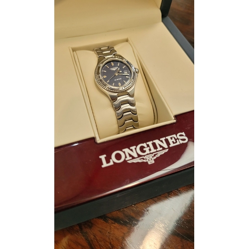 118 - A LADIES LONGINES CASED 'SPORT WING' WATCH, Swiss made, stainless steel, numbered 28403644 to the ba... 