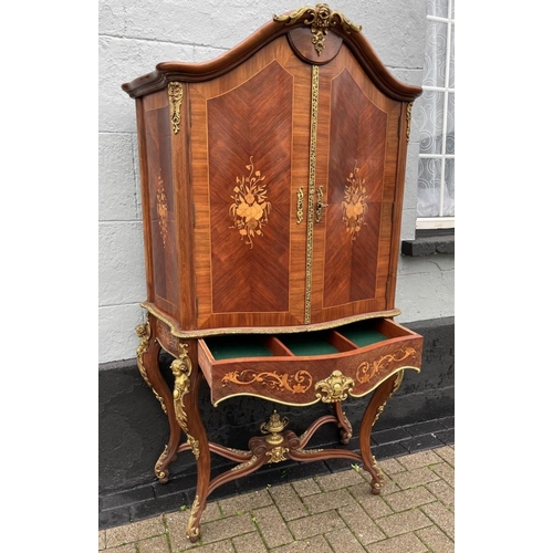 1 - A HIGHLY DECORATIVE QUEEN ANNE STYLE DRINKS CABINET, serpentine shaped, satinwood and kingwood, high... 