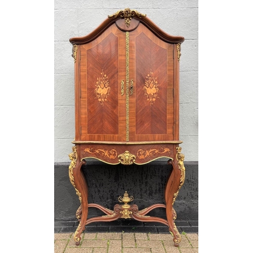 1 - A HIGHLY DECORATIVE QUEEN ANNE STYLE DRINKS CABINET, serpentine shaped, satinwood and kingwood, high... 